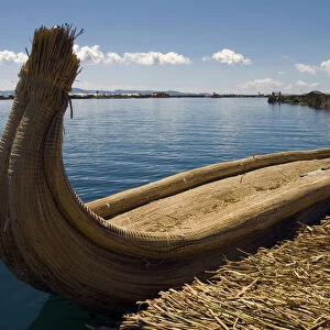 Peru, Lake Titicaca, Uros Floating Islands, a moored reed boat