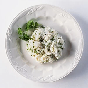 Plate of Baccala mantecata, a pureed, dried salted cod dish with parsley, from the Veneto, Italy, view from above