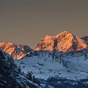 Last rays of sun illuminate the Grand Combin massif, beyond the Rhemes valley, Grand Combin, Switzerland, Aosta Valley, Italy, Europe