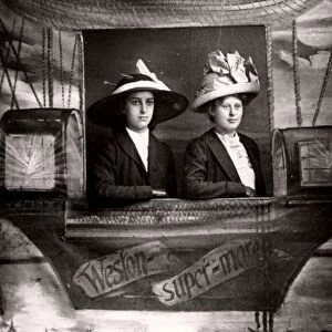 Seaside holiday photograph from Weston-super-Mare, Somerset. Women posing in a mock