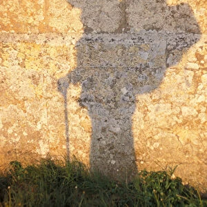 Shadow of a pilgrim on his way to Santiago of Compostela