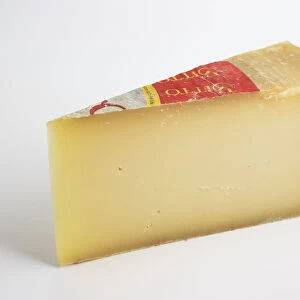 Slice of Spanish Flor de Guia ewe and cows milk cheese
