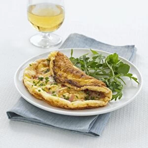 Souffle omelette with rocket on plate