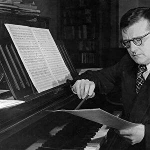 Soviet composer, dmitri shostakovich, working at his piano, 1950, he won the stalin prize for his oratorio song of the woods and the music to the film the fall of berlin