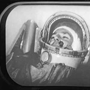 Soviet cosmonaut gherman titov in the space capsule, vostok 2 mission - he was observed the entire flight, 1961, a still from the documentary film to the stars again
