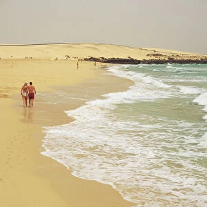 Spain, Canary Islands, Fuerteventura, Corralejo, water lapping onto beach