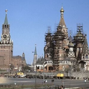 St, basils cathedral under renovation in red square with the moscow kremlin on the left, 1980s