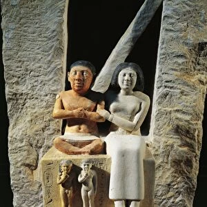 Statue of dwarf Seneb with wife Sentiotes and children, from Giza