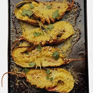 Steamed bhapa lobster curry on baking tray