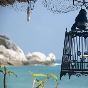 Thailand, Ko Phangan, Hat Yuan, view of bird cage with sea in the background