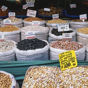 Turkey, Instambul, Spice Bazaar, stall selling nuts and seeds in white sacks, labels displaying prices