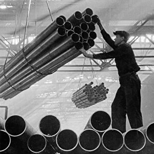 Ural industrial area, a worker handling finished products at the chelyabinsk pipe factory, this shop was completed and turning out finished products in the course of four months in 1942