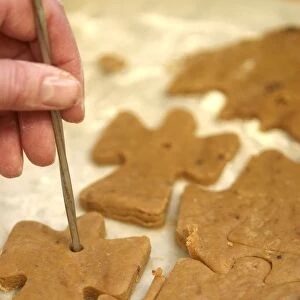Using pastry cutter to make pastry angels