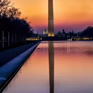 Washington Monument and reflecting pond at sunrise, Washington D. C