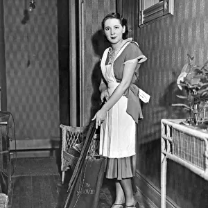A Woman Vacuuming