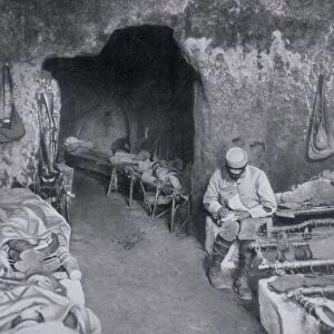 World War I 1914-1918: French soldiers resting in a grotto in a trench complex. Most