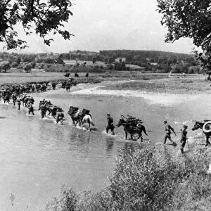 The x mountain pack 107mm mortar regiment crossing a river in the foothills of the carpathians, july 1944, world war ll