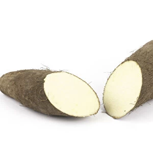 Yam cut into half on white background