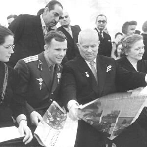 Yuri gagarin and his wife (left) with nikita khrushchev at areception held in his honor at the grand kremlin palace on april 14, 1961
