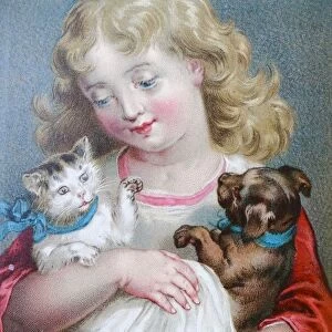 Blond girl sitting and holding a young cat and dog in her arms
