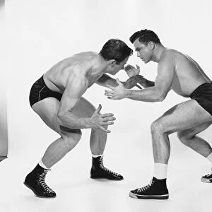 Two men wrestling