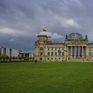 Reichstag building under a cloudy sky, Berlin, Germany