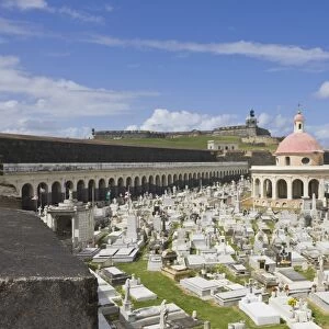 San Juan Cemetery with El Morro, a 16th Century fortress (a UNESCO World Heritage site) in the background