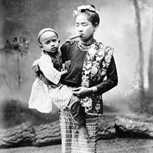 Burmese Woman with Child and Smoking a Cheroot, c. 1870-90 (b / w photo)