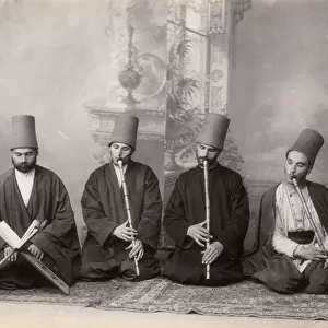 Three Dervish musicians and a singer, Turkey, c. 1890 (b / w photo)