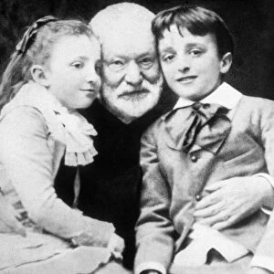 French writer Victor Hugo with his Grandchildren Jeanne and Georges, 1859 (b / w photo)