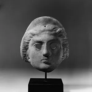 Hellenistic theatre mask, c. 3rd century BC (terracotta)