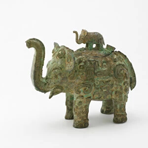 Lidded ritual ewer (huo) in the form of an elephant with masks and dragons