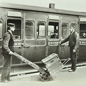 Platform Porters at a railway station, 1885 (b / w photo)