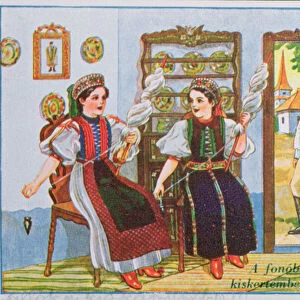 Postcard depicting women in traditional Hungarian dress spinning