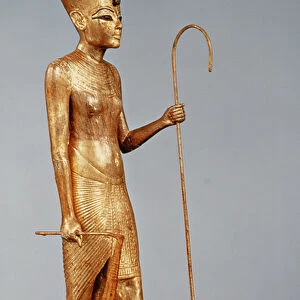Statuette of the king wearing the red crown of the north, from the tomb of Tutankhamun (c