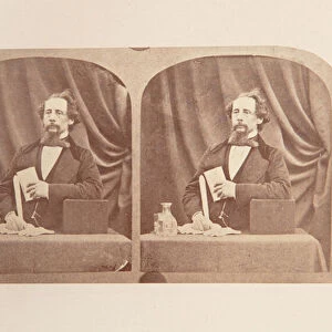 Stereograph of Charles Dickens posed as if reading, 1858 (b / w photo)
