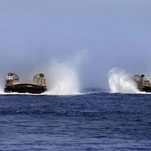 Landing Craft Air Cushion 84 and 87 conduct operations in the U