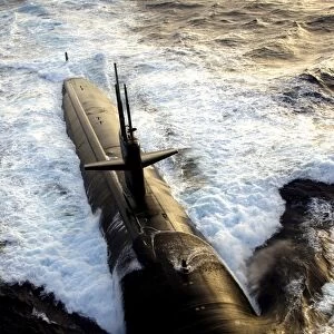 The Los Angeles-class submarine USS Albuquerque surfaces in the Atlantic Ocean