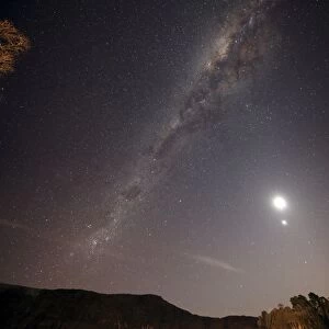 The Milky Way, the Moon and Venus over the fields in Azul, Argentina