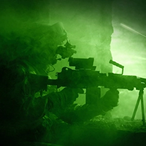 Night vision view of a U. S. Army Ranger in Afghanistan combat scene