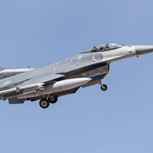 A U. S. Air Force F-16C turns on to final approach at Nellis Air Force Base, Nevada