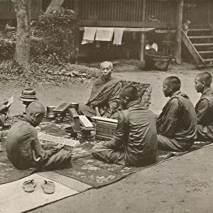 Buddhist Priest with Pupils, 1900. Creator: Unknown