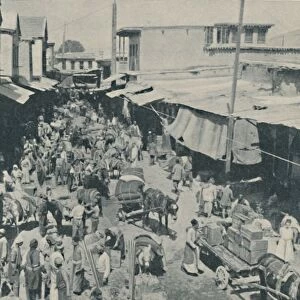 Chaffering Oriental Crowds That Throng The Street Markets, c1935. Artist: Charles H Gabriel