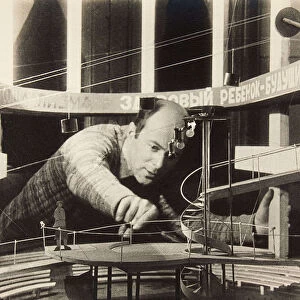 El Lissitzky Working on a Stage Design, Meyerhold Theatre, 1929. Creator: Anonymous