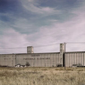 Grain elevators along the route of the Atchison, Topeka, and Santa Fe RR, Amarillo, Texas, 1943. Creator: Jack Delano