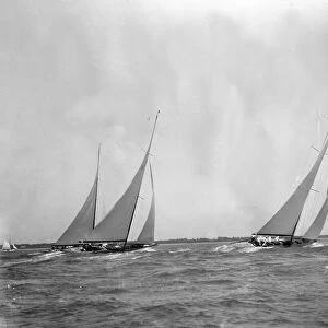 A group of 12 Metres sailing yachts racing on windward leg in good wind, 1933. Creator