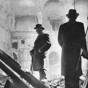 Mr. Churchill contemplates the ruins of the House of Commons, bombed in May 1941, 1941