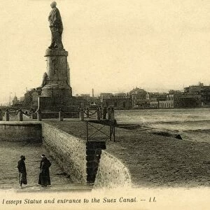 Port Said. - Lesseps Statue and entrance to the Suez Canal - LL. c1918-c1939. Creator: Unknown