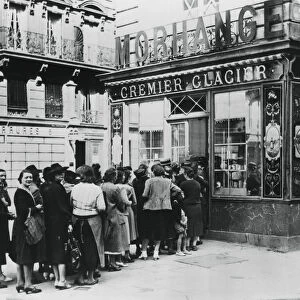 Queue of women outside a dairy shop, German-occupied Paris, 28 June 1940