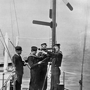Signalling by semaphore on board HMS Camperdown, 1895. Artist: Gregory & Co